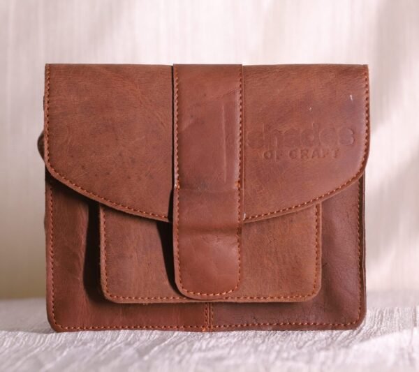 brown leather sling bag